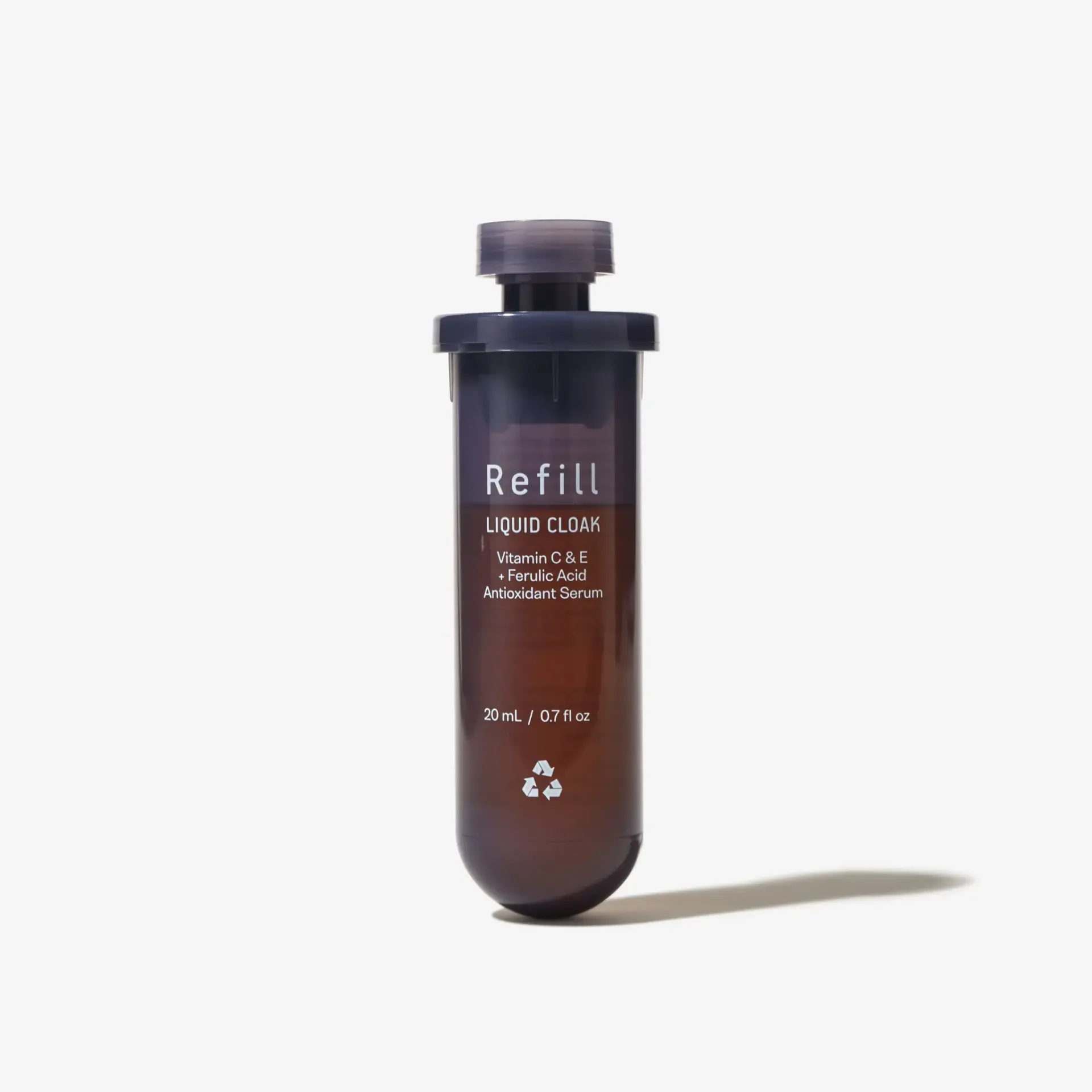 A cylindrical bottle labeled 