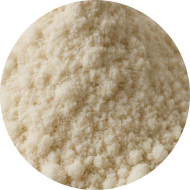 Close-up of a mound of off-white, finely granulated powder, showing a slightly coarse and uneven texture.